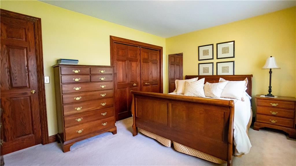 7034 Forrest Trail Road Butler, PA 16002 - Photo 18 of 25 a bed room with a bed and a dresser