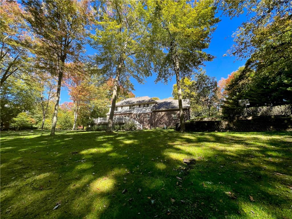 7034 Forrest Trail Road Butler, PA 16002 - Photo 23 of 25 a view of a big yard with plants and large trees