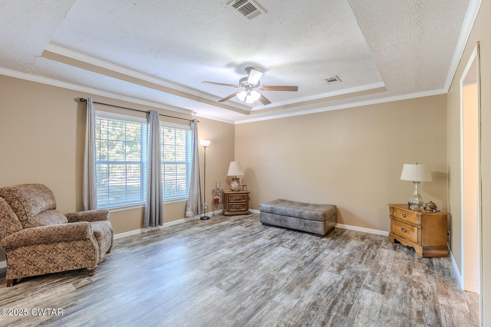 2785 Highway 138 Toone, TN 38381 - Photo 28 of 29 a living room with furniture and a chandelier