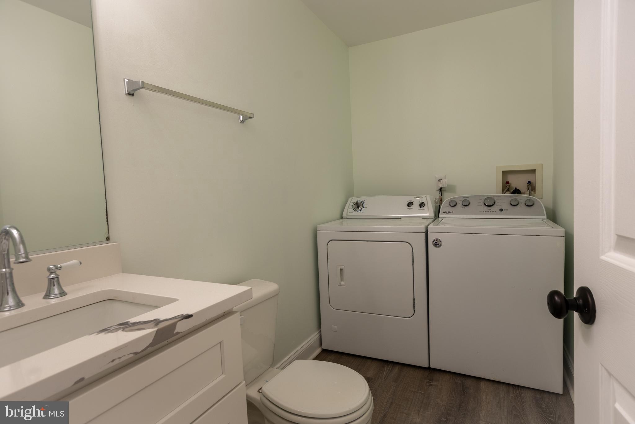 11904 White Heather Road Cockeysville, MD 21030 - Photo 37 of 42 a utility room with dryer and washer