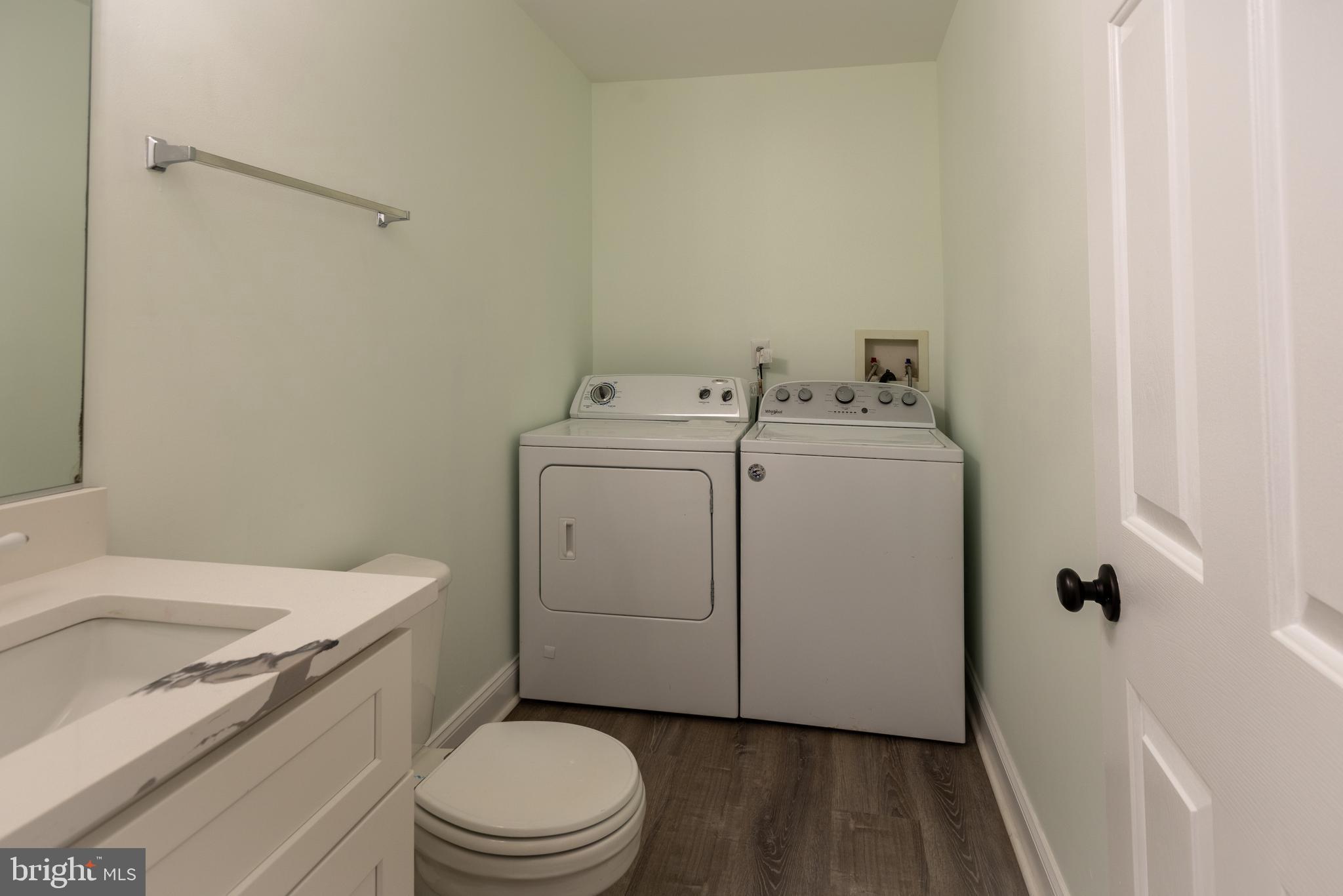 11904 White Heather Road Cockeysville, MD 21030 - Photo 38 of 42 a utility room with dryer and washer