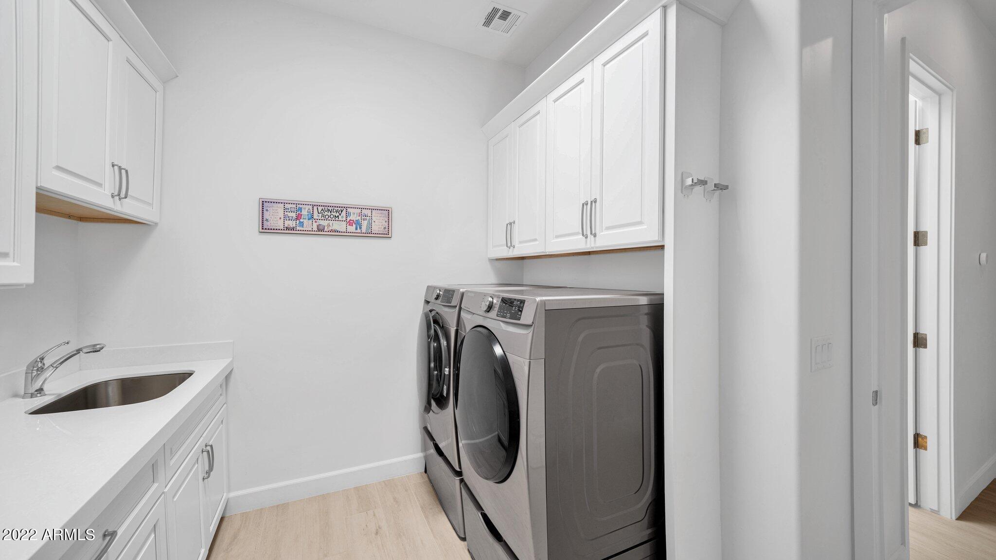 31217 North Ranch Road Cave Creek, AZ 85331 - Photo 46 of 77 Laundry room with ample storage and sink