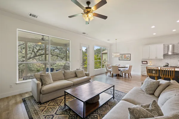a living room with furniture and a window
