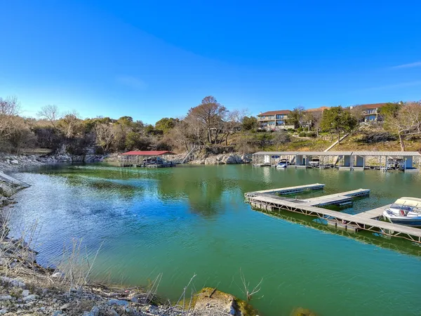 a view of a lake with outside a house