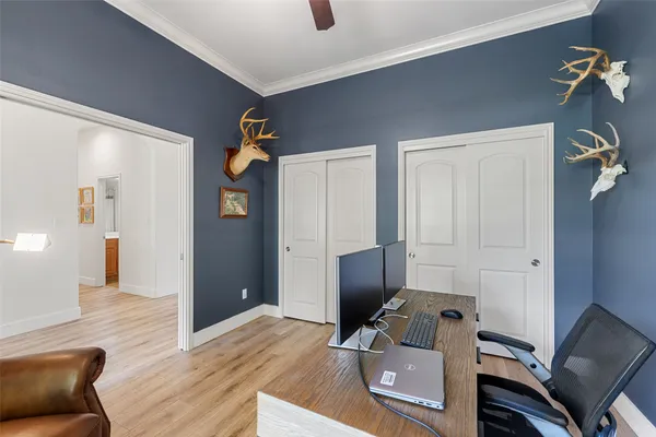 a room with furniture and wooden floor