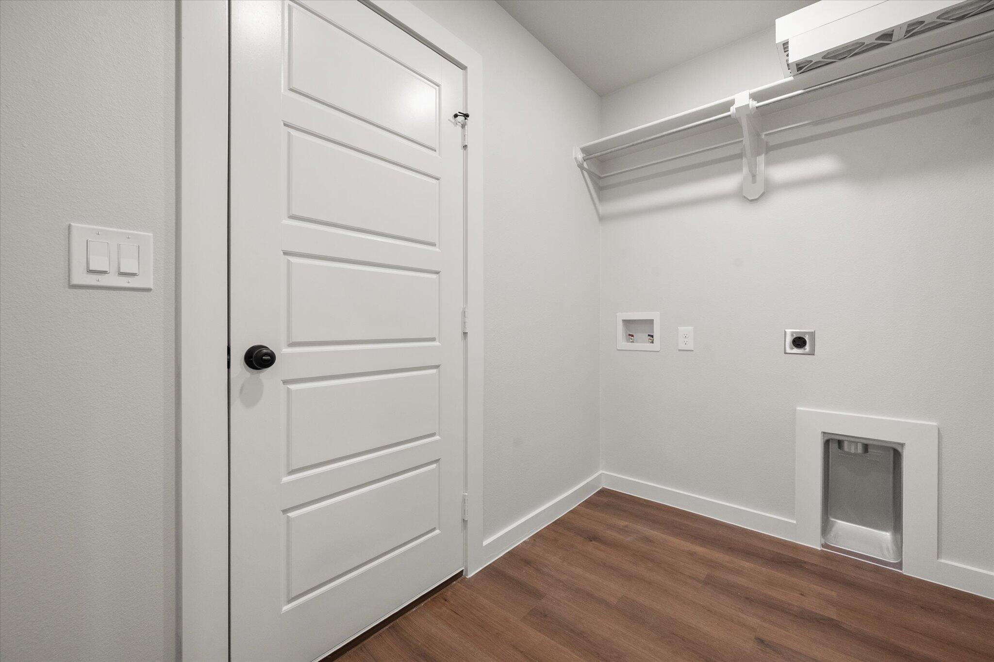 8607 29th Street Lubbock, TX 79407 - Photo 18 of 20 a view of a room with wooden floor