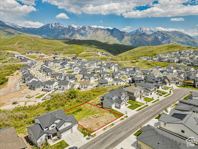 14673 South Ravine Rock Way East, Unit 720 Draper, UT 84020 - Photo 11 of 15 Aerial view of residential area featuring property boundaries highlighted and mountains