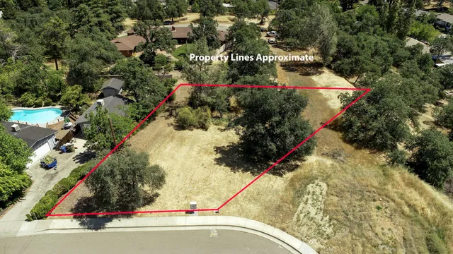 a view of a yard with an outdoor space