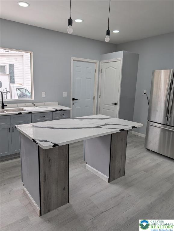 7487 Camp Meeting Road New Tripoli, PA 18066 - Photo 14 of 45 a kitchen with a sink a counter top space stainless steel appliances and cabinets