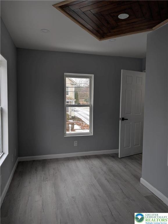 7487 Camp Meeting Road New Tripoli, PA 18066 - Photo 31 of 45 an empty room with wooden floor and windows