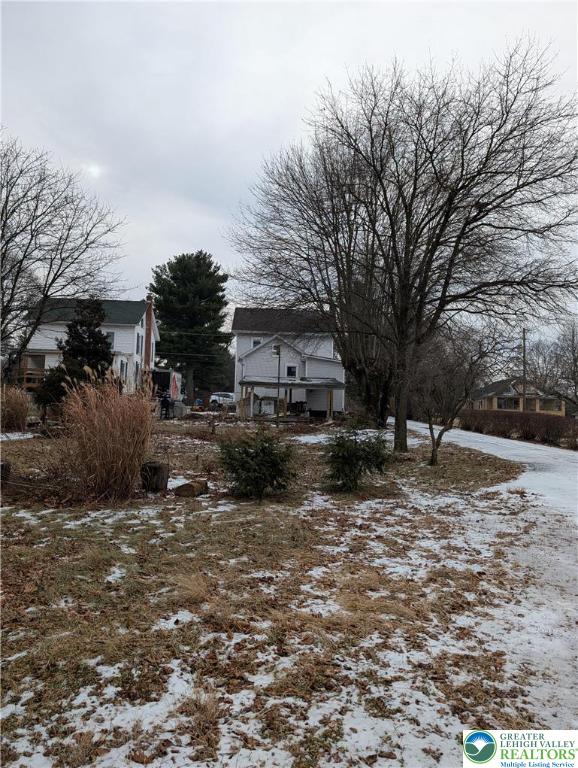 7487 Camp Meeting Road New Tripoli, PA 18066 - Photo 4 of 45 a view of outdoor space with deck and trees