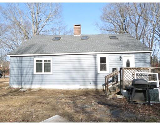 94 Rice Corner Road Brookfield, MA 01506 - Photo 24 of 24 a backyard of a house with table and chairs