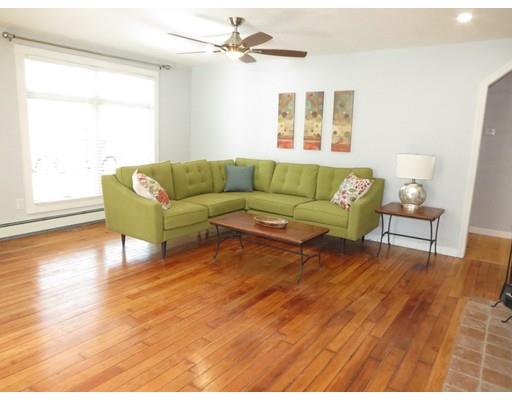 94 Rice Corner Road Brookfield, MA 01506 - Photo 3 of 24 a living room with furniture and a wooden floor