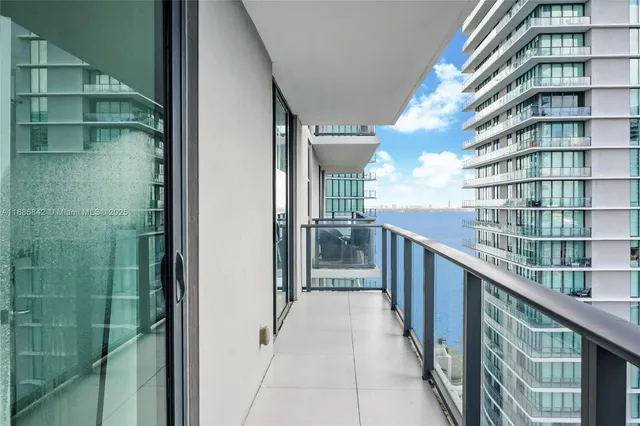 a view of balcony with a potted plant
