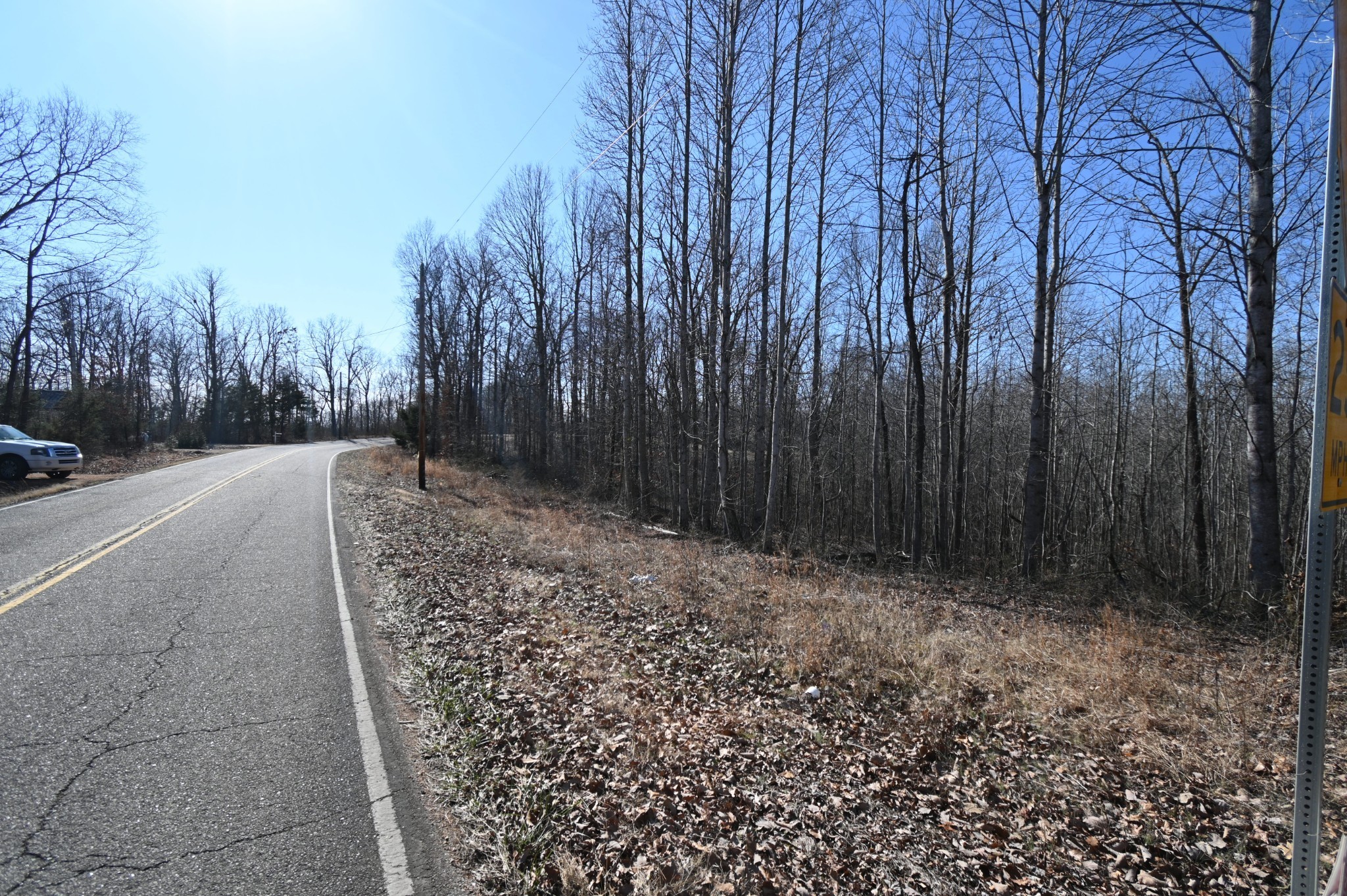 2172 Airport Ridge Road Linden, TN 37096 - Photo 7 of 10 a backyard of a house with lots of green space