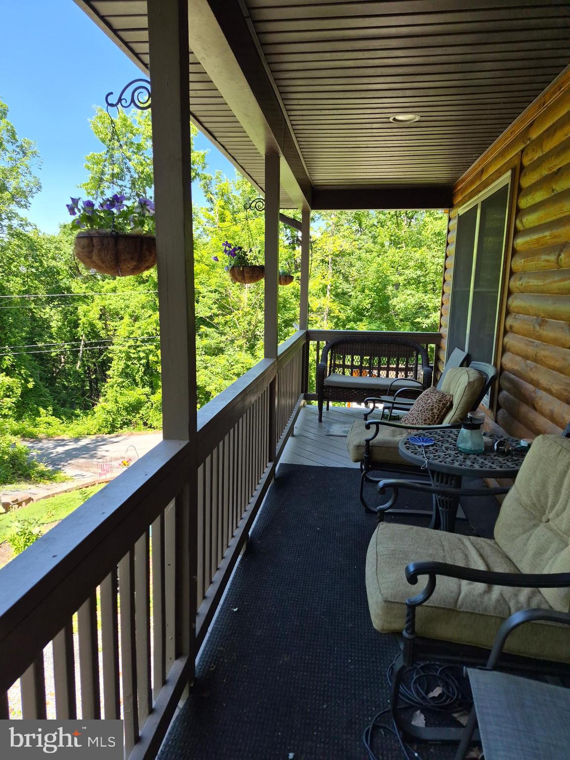 1440 Drummer Hill Road Front Royal, VA 22630 - Photo 4 of 42 a balcony with wooden floor