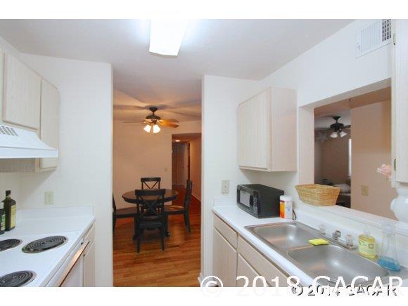 2360 Southwest Archer Road Gainesville, FL 32608 - Photo 11 of 24 Galley Style Kitchen