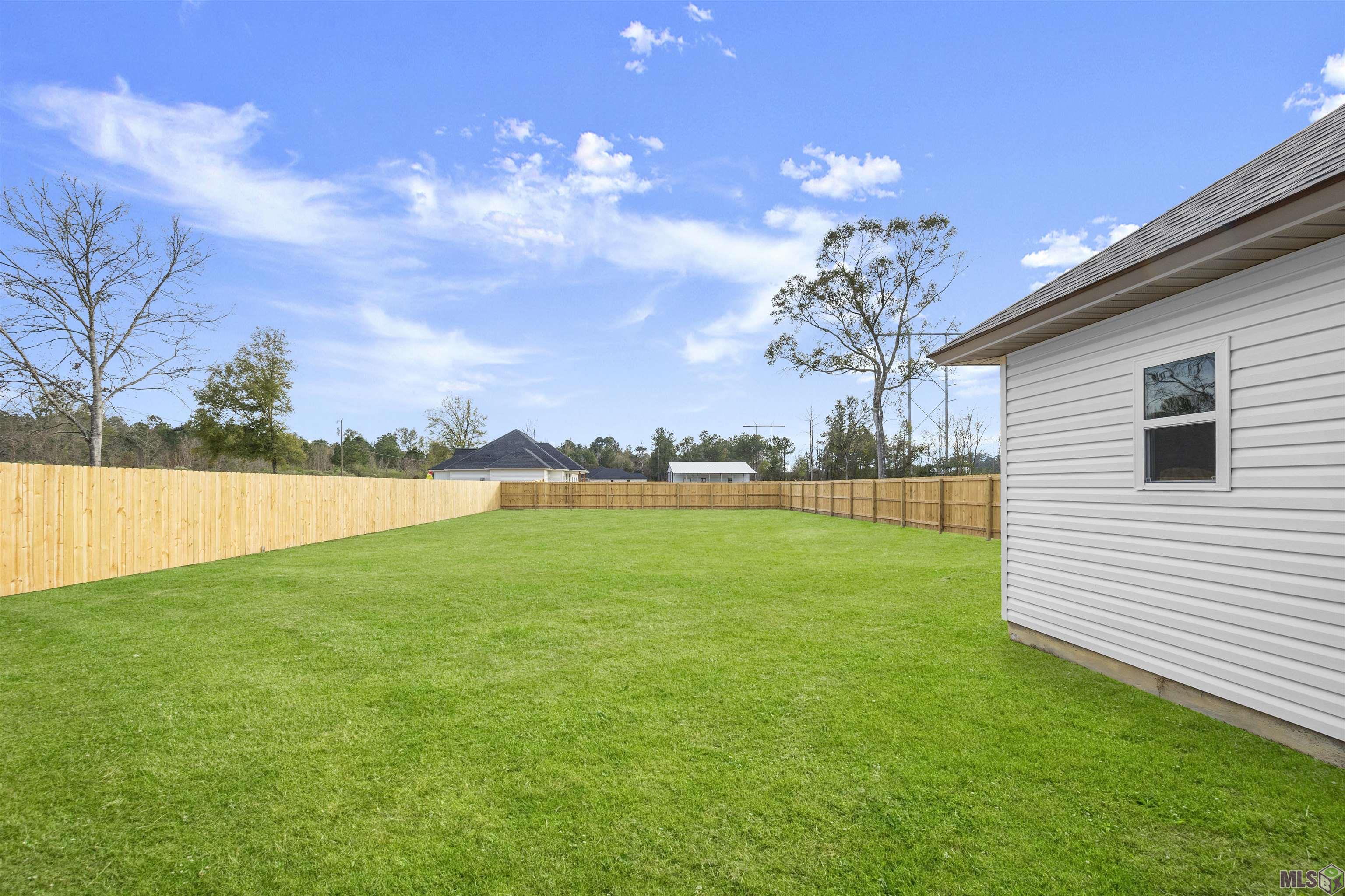FULLY FENCED Back Yard