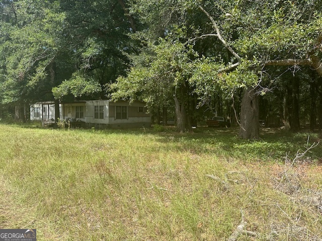 1932 Marshallville Road Perry, GA 31069 - Photo 5 of 14 a backyard of a house with lots of green space