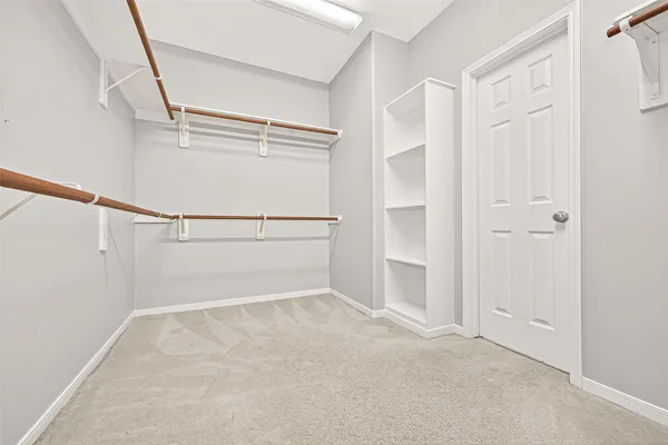 a view of an empty walk in closet