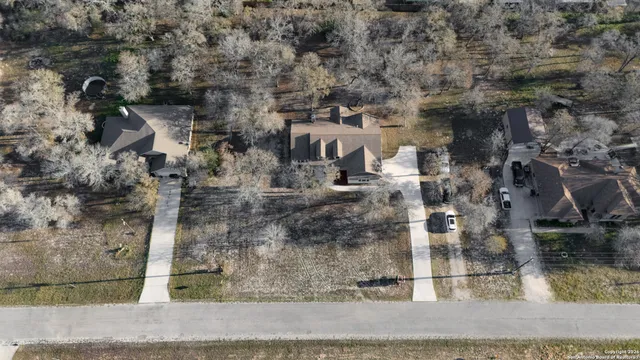 a bedroom with a bed and a table