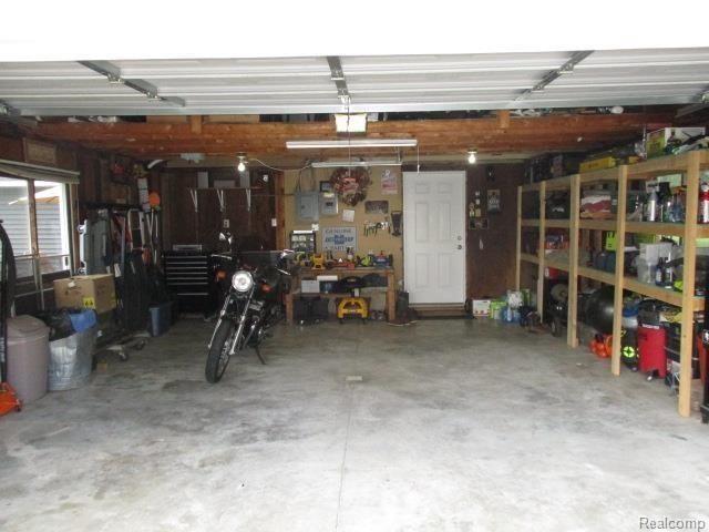 1403 Highland Road Highland, MI 48357 - Photo 15 of 18 1403 Highland garage inside.jpg