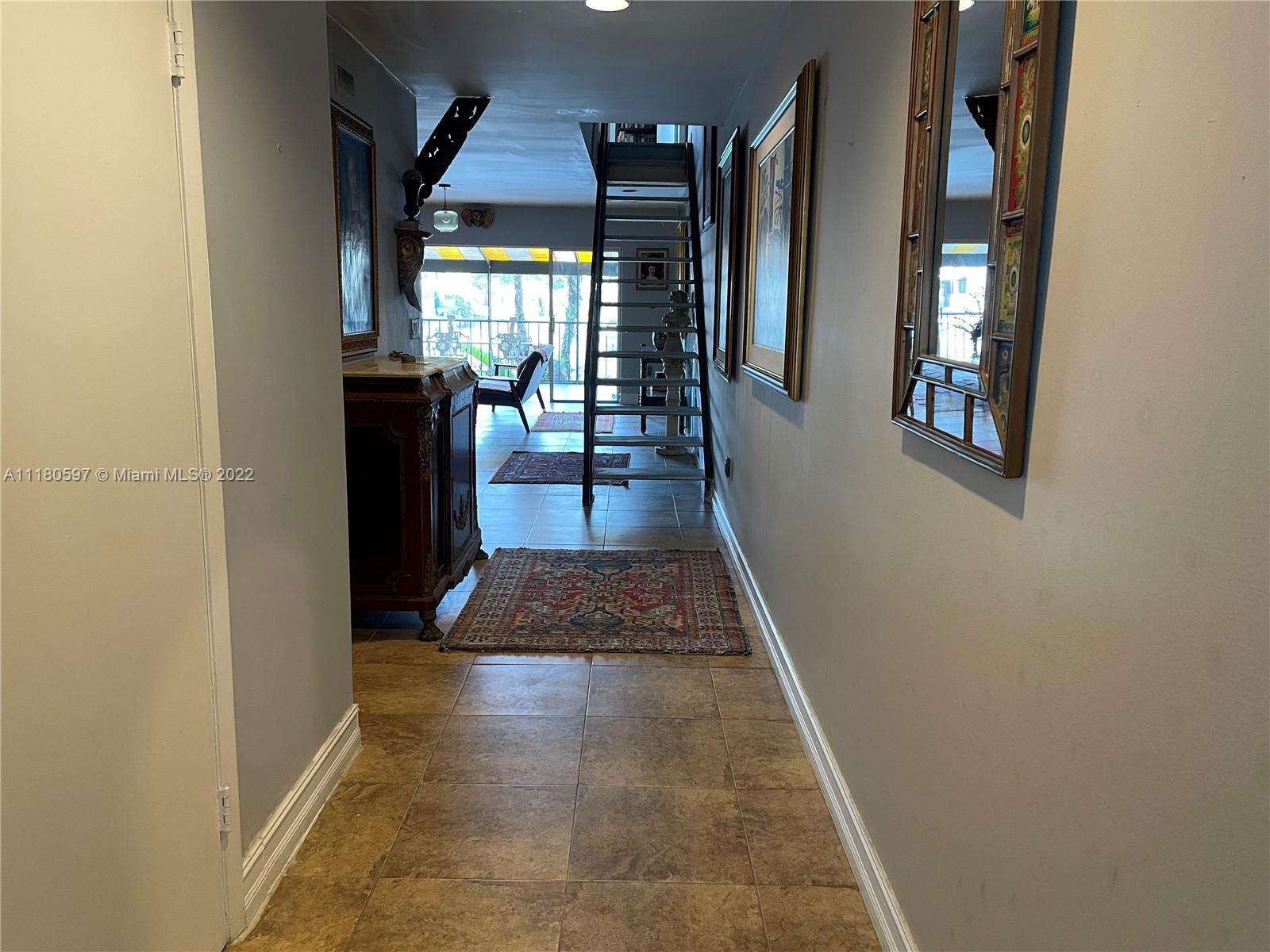 6411 Windmill Gate Road Miami Lakes, FL 33014 - Photo 2 of 23 a view of gallery with windows
