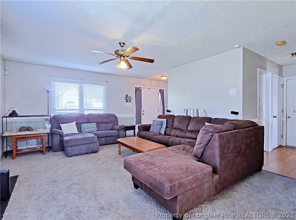 5218 Pringle Way Hope Mills, NC 28348 - Photo 8 of 43 a living room with furniture and a window
