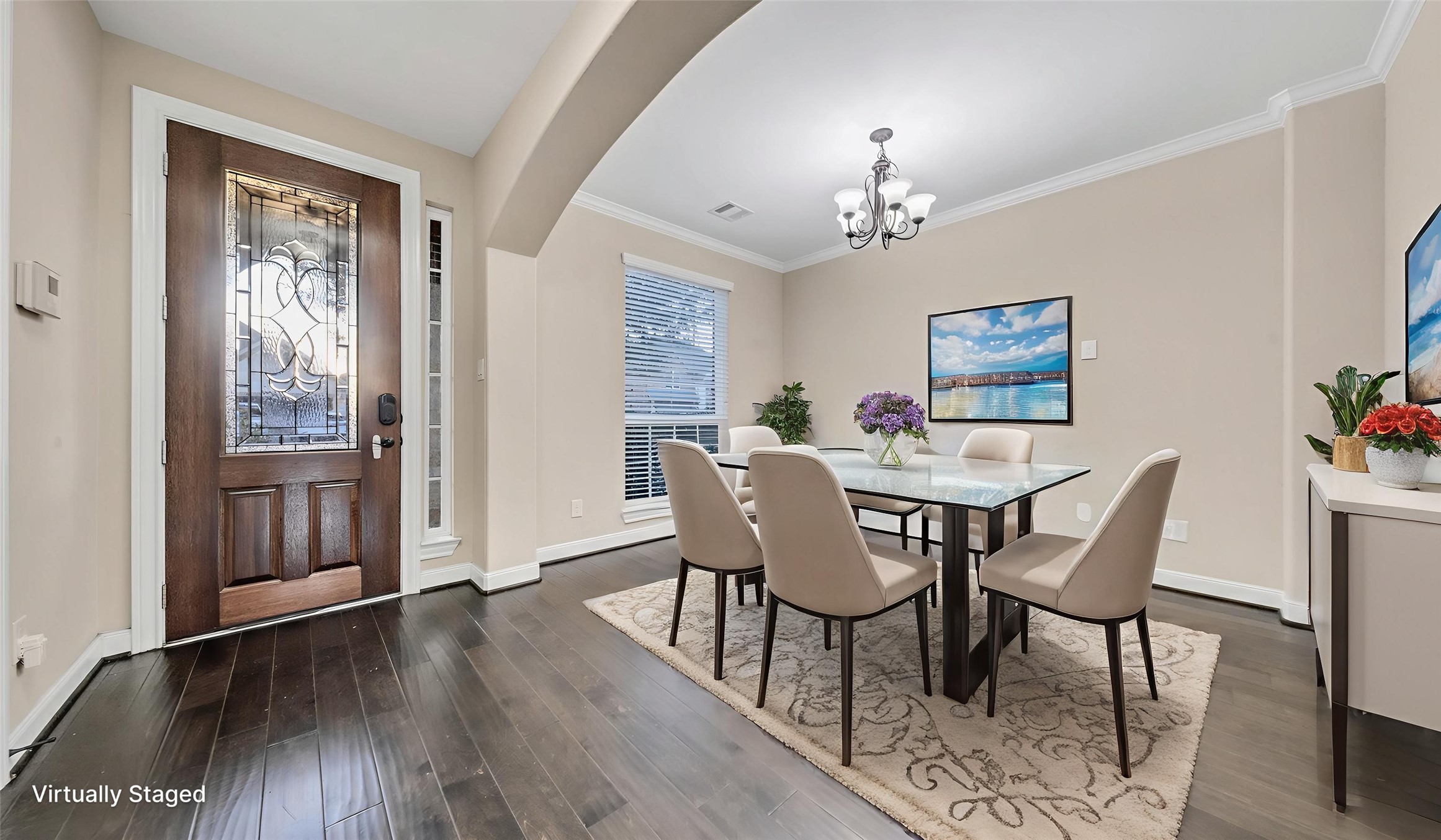 18118 Berry Garden Lane Spring, TX 77379 - Photo 5 of 45 Spacious formal dining room with crown molding and large window, virtually staged to show layout potential.