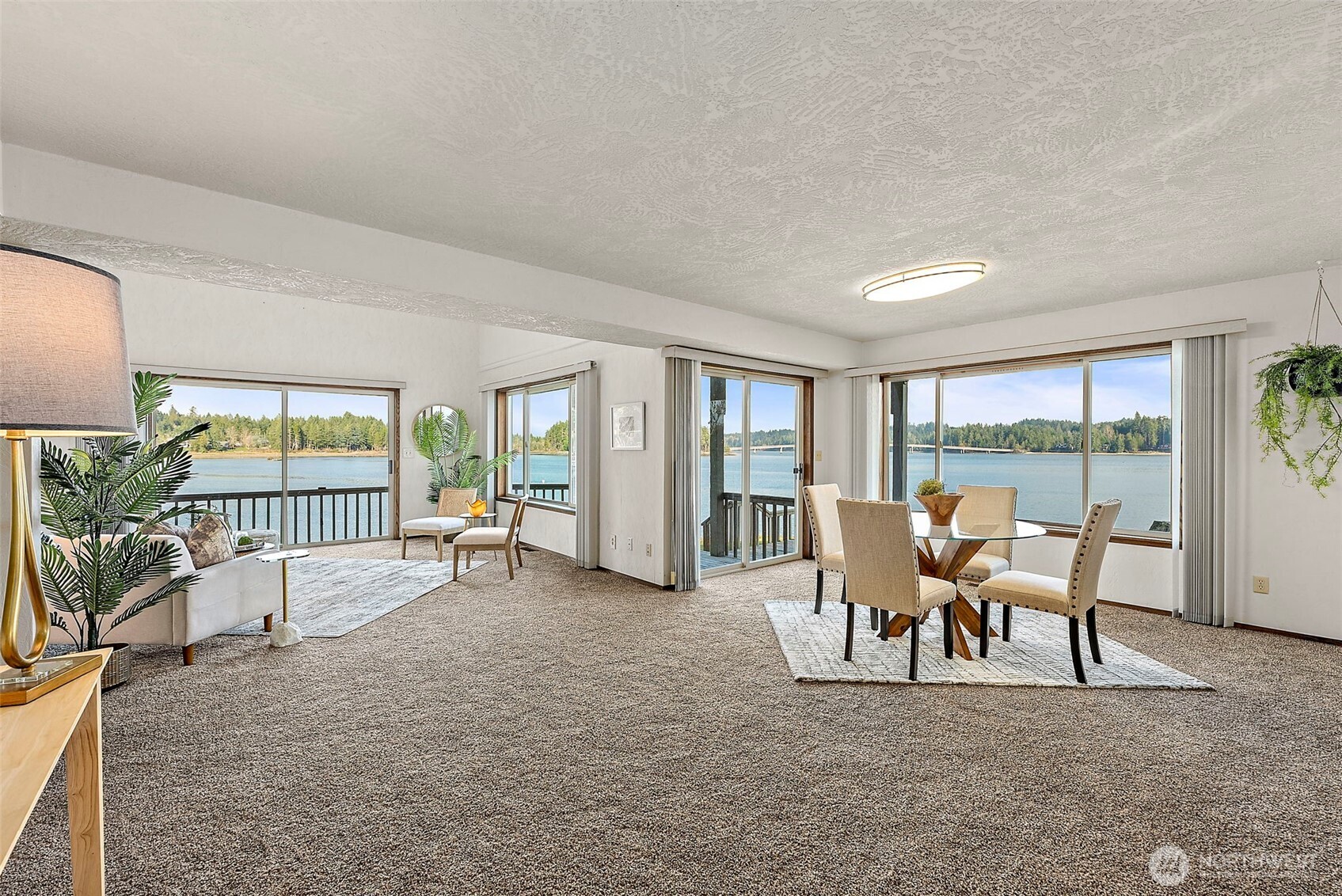 130 East Old Winery Road Shelton, WA 98584 - Photo 2 of 40 a view of a livingroom with furniture and floor to ceiling window