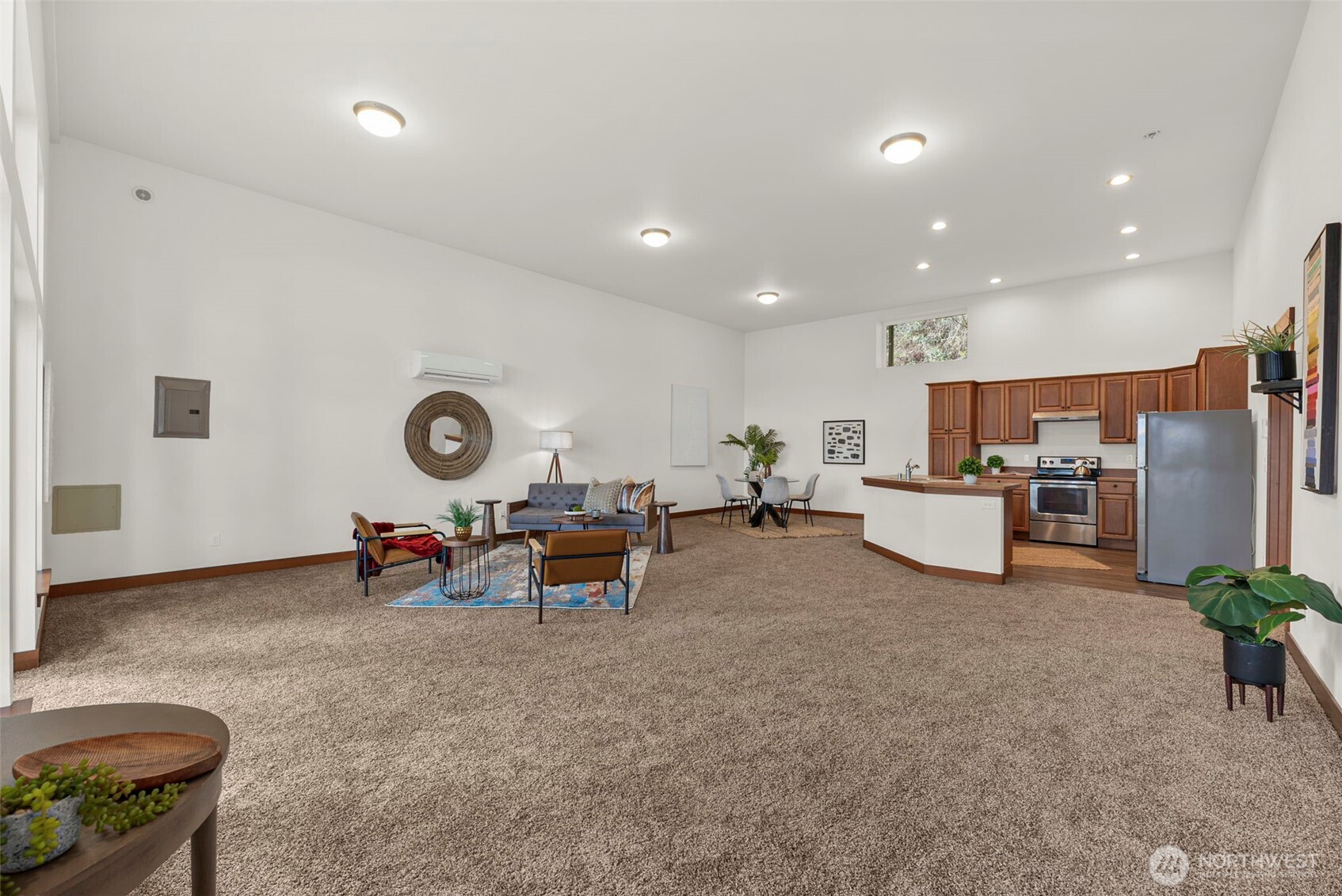 130 East Old Winery Road Shelton, WA 98584 - Photo 28 of 40 a view of a dining room with furniture and a kitchen