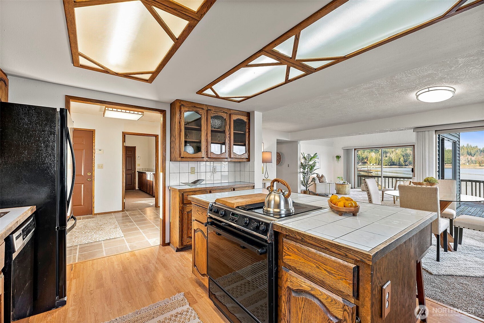 130 East Old Winery Road Shelton, WA 98584 - Photo 10 of 40 a kitchen that has a sink a stove and a refrigerator