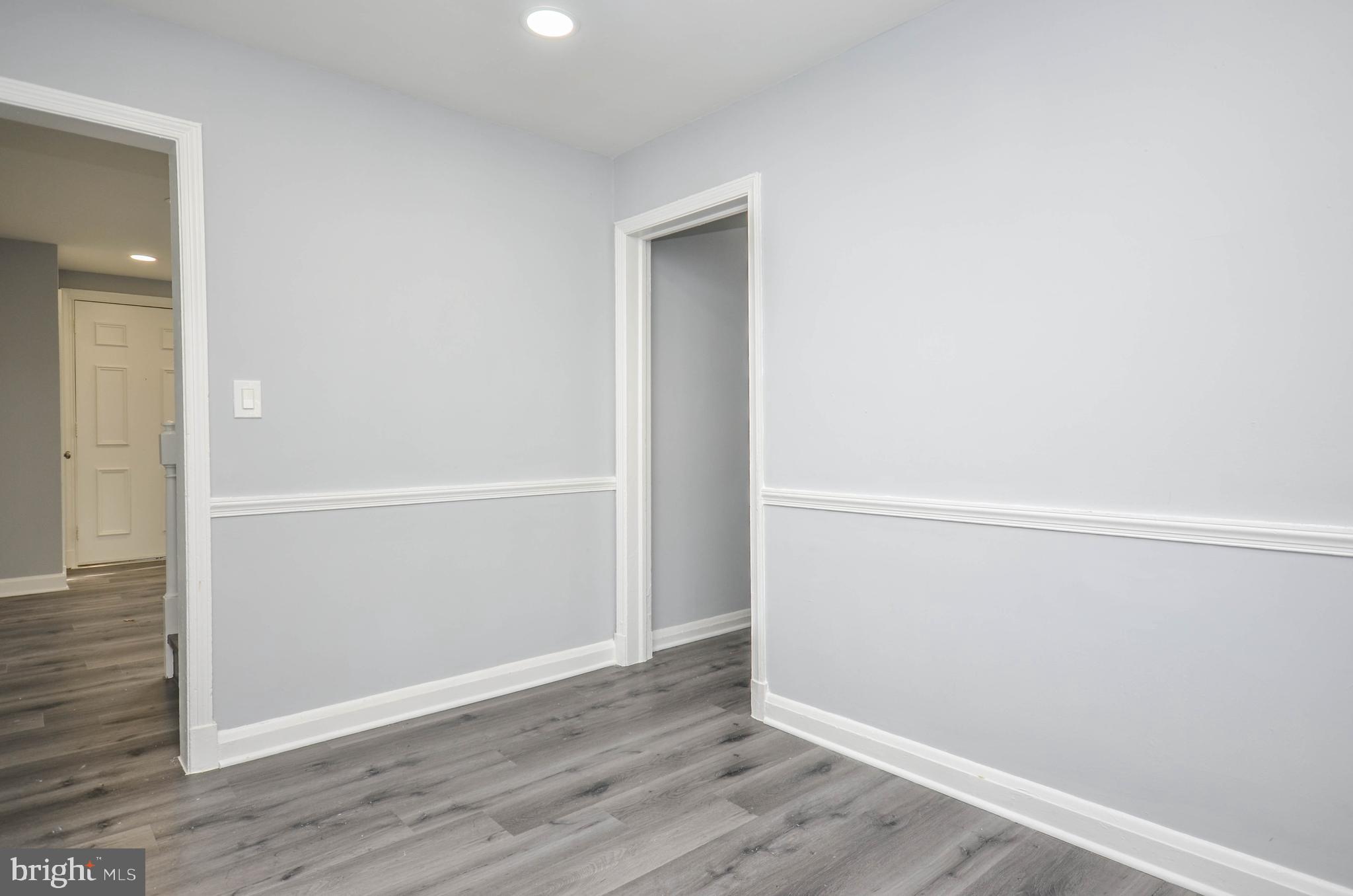 3917 Dudley Avenue Baltimore, MD 21213 - Photo 7 of 23 a view of an empty room