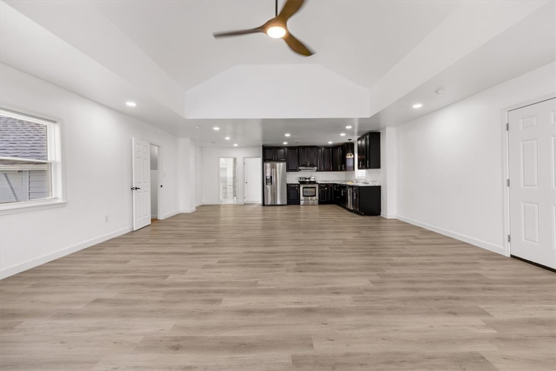 629 Little Meadow Drive Riverside, OH 45404 - Photo 12 of 48 This expansive open concept space features a kitchen and durable flooring, ideal for modern living.