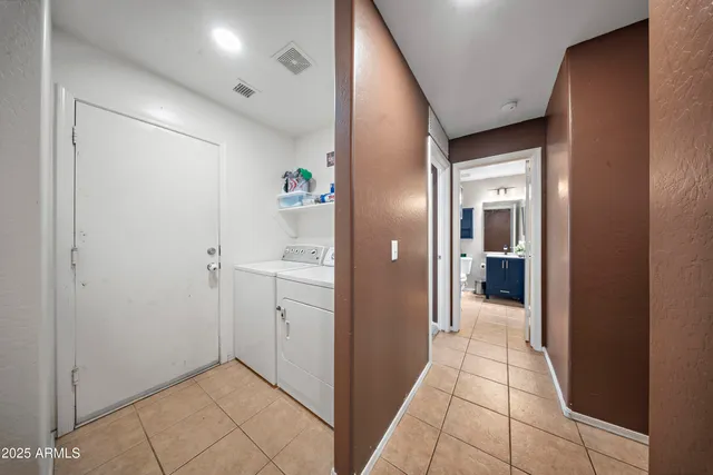 a bedroom with furniture and windows