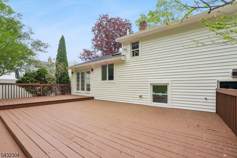 34 Clark Street Summit, NJ 07901 - Photo 32 of 36 a view of a terrace with a garden