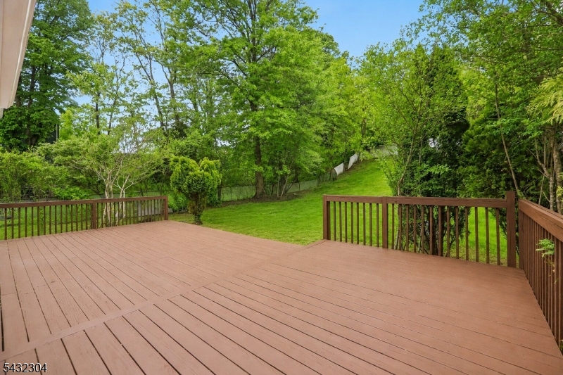 34 Clark Street Summit, NJ 07901 - Photo 33 of 36 a view of backyard with a small deck