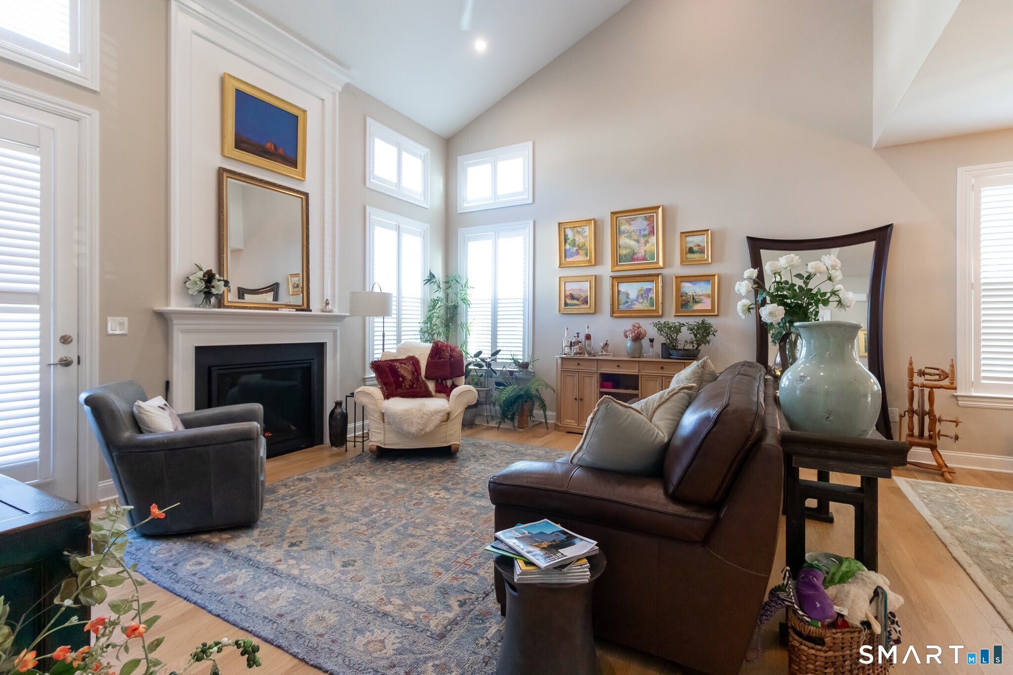 22 Soderman Way Cheshire, CT 06410 - Photo 12 of 40 a living room with furniture fireplace and a large window