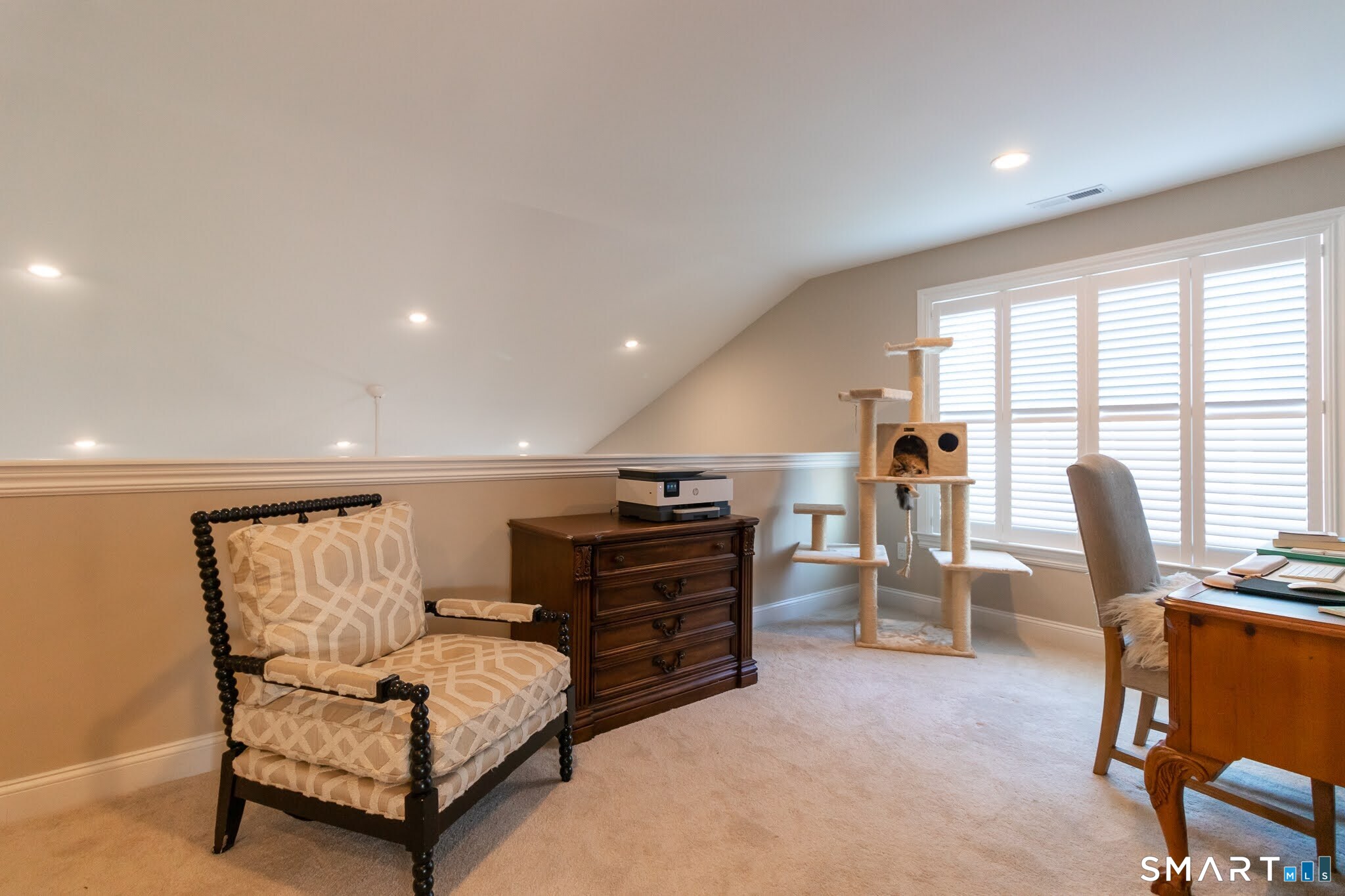 22 Soderman Way Cheshire, CT 06410 - Photo 22 of 40 a living room with furniture and a flat screen tv