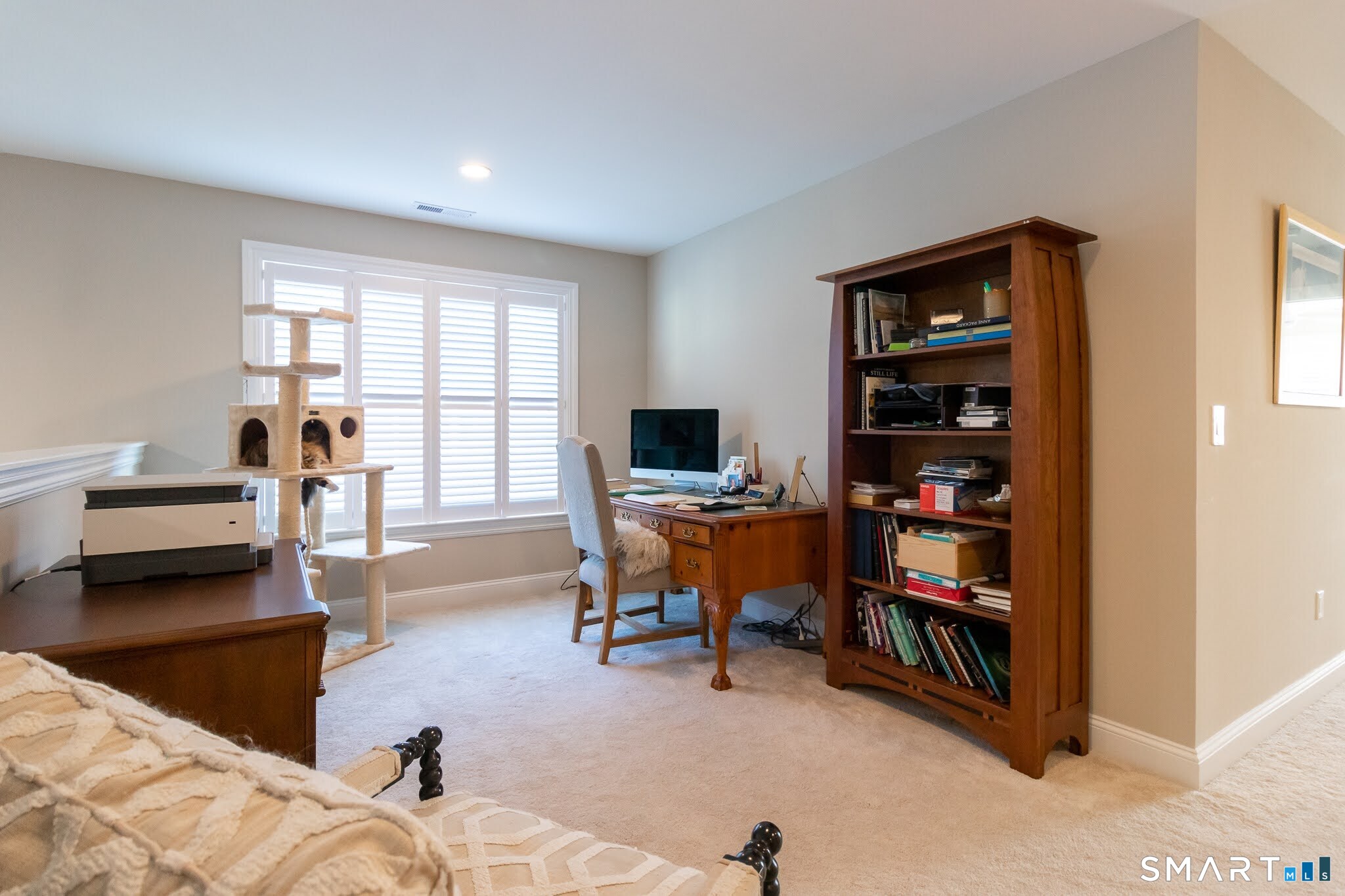 22 Soderman Way Cheshire, CT 06410 - Photo 23 of 40 a living room with furniture and a flat screen tv