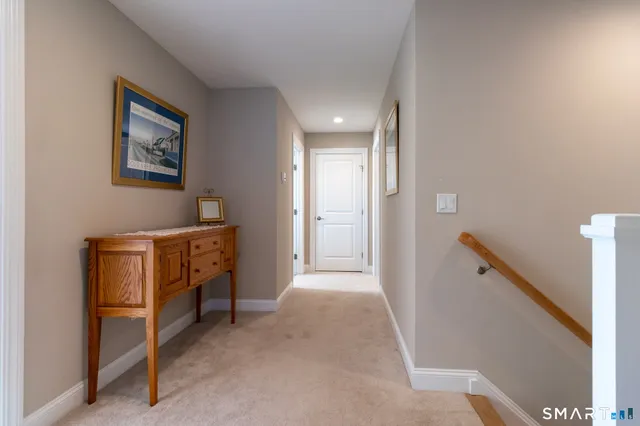a view of a hallway with workspace