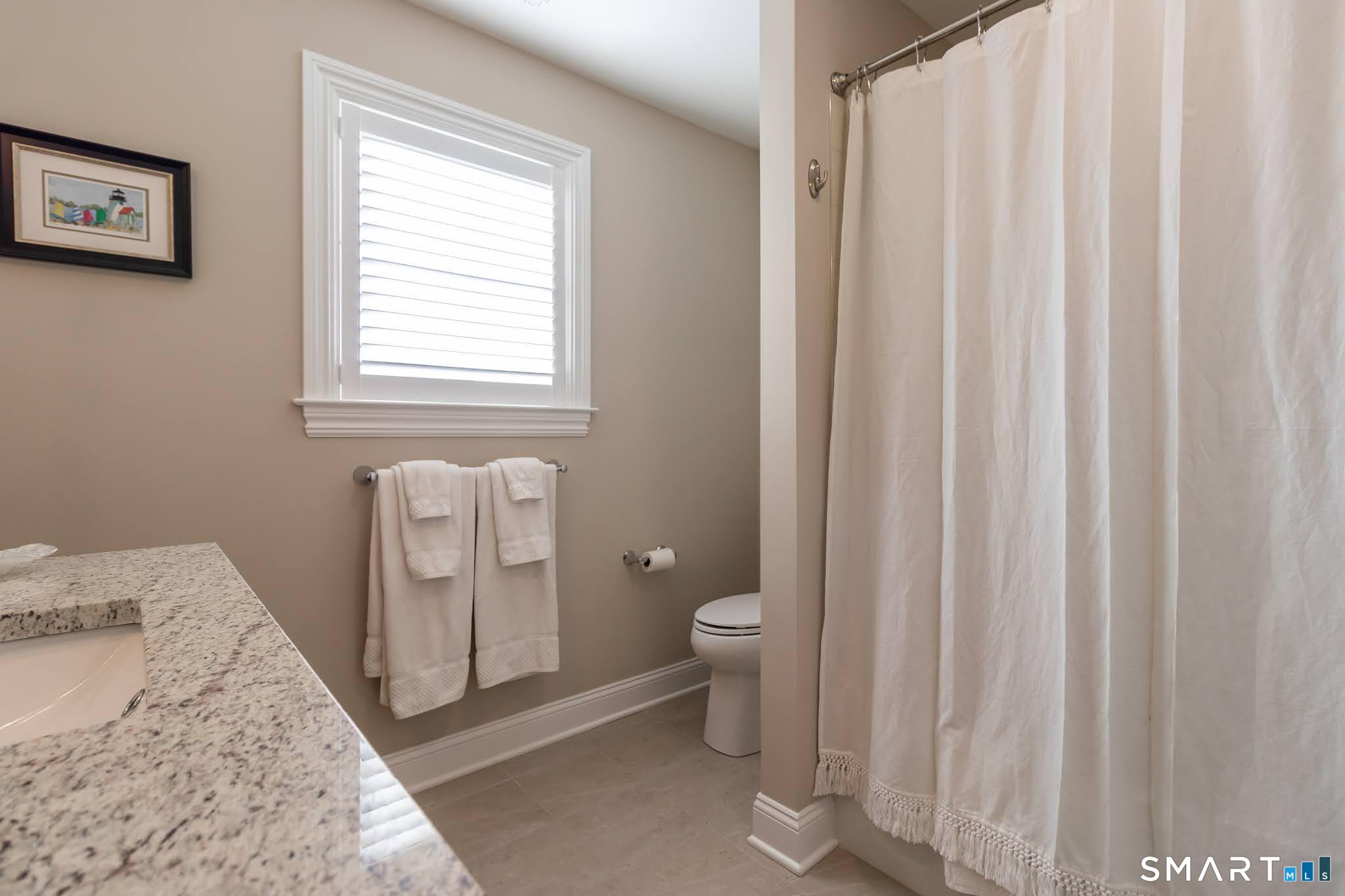 22 Soderman Way Cheshire, CT 06410 - Photo 29 of 40 a spacious bathroom with a toilet sink and a shower
