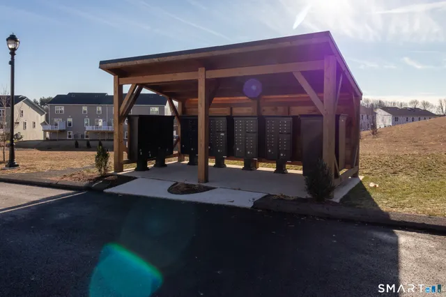 a view of a house with backyard floor and a potted plants