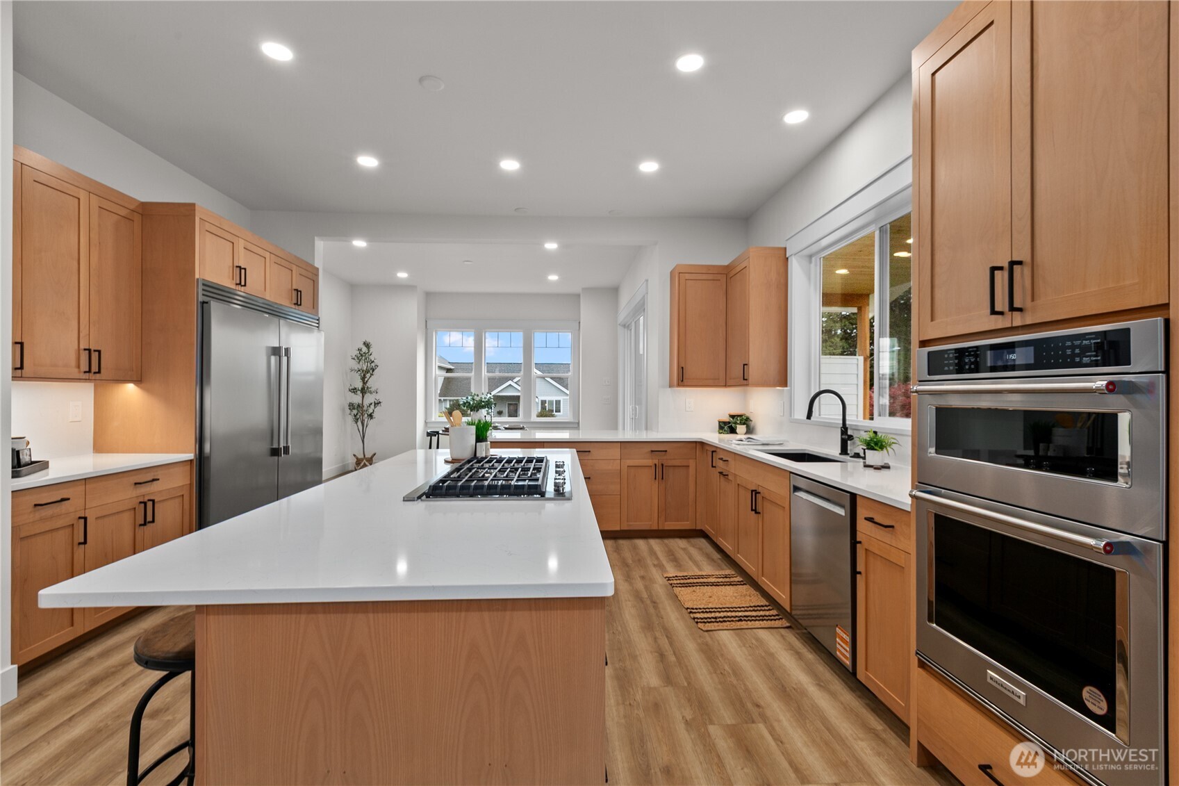 1095 Terrace Drive Lynden, WA 98264 - Photo 12 of 39 a kitchen with a sink a stove and cabinets