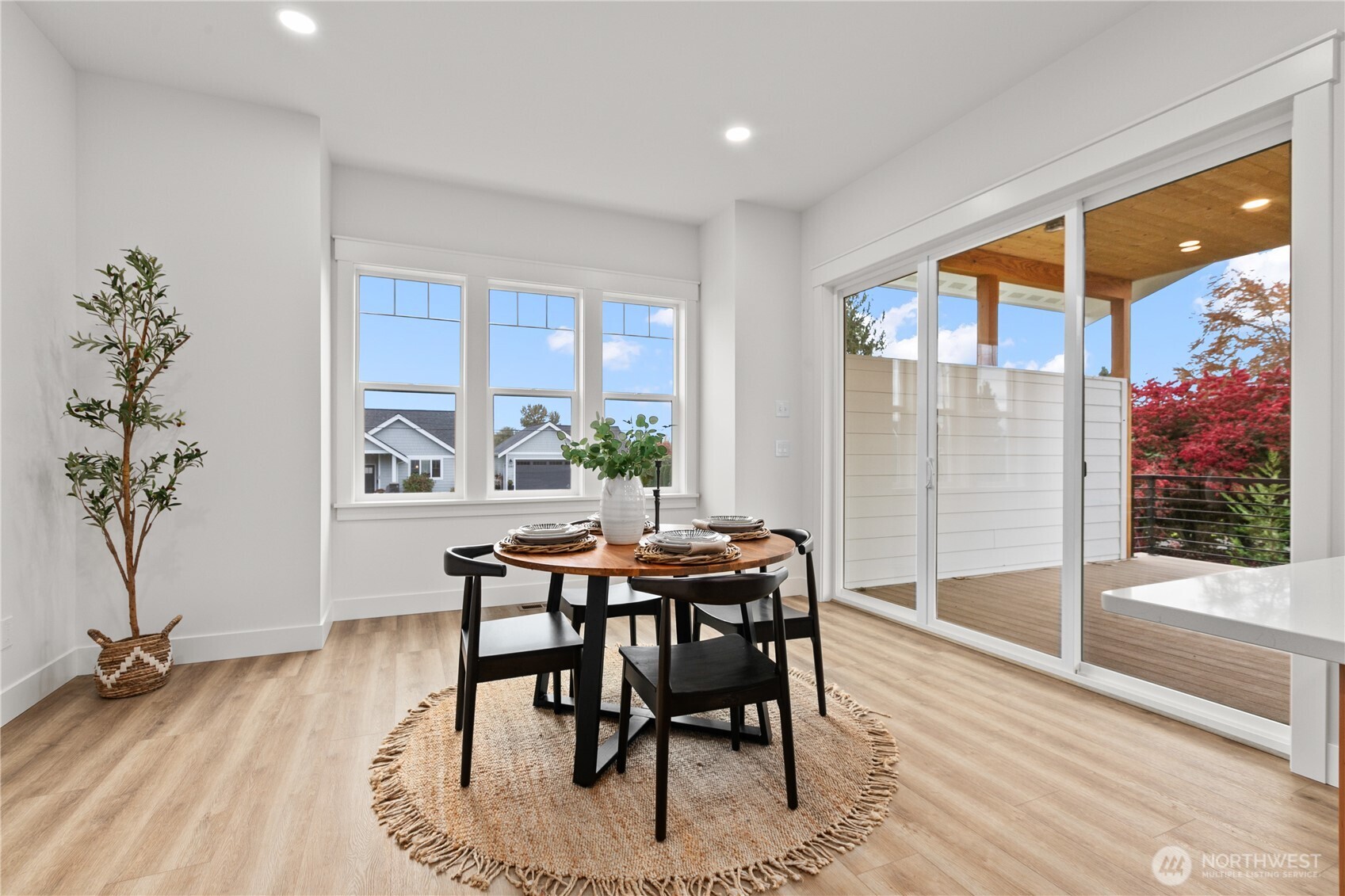 1095 Terrace Drive Lynden, WA 98264 - Photo 15 of 39 a view of a dining room with furniture window and wooden floor
