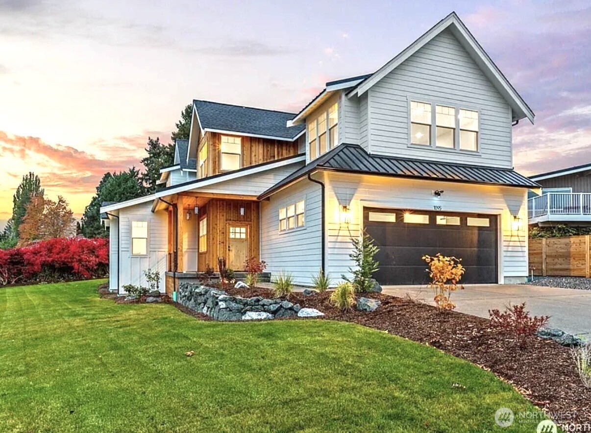 1095 Terrace Drive Lynden, WA 98264 - Photo 4 of 39 a front view of house with yard and outdoor seating