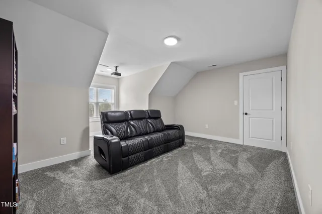 a room with furniture and a window