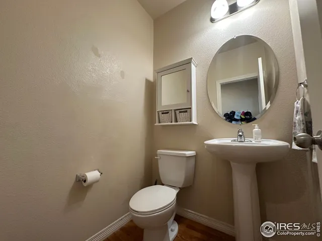 a view of a livingroom with storage and utility