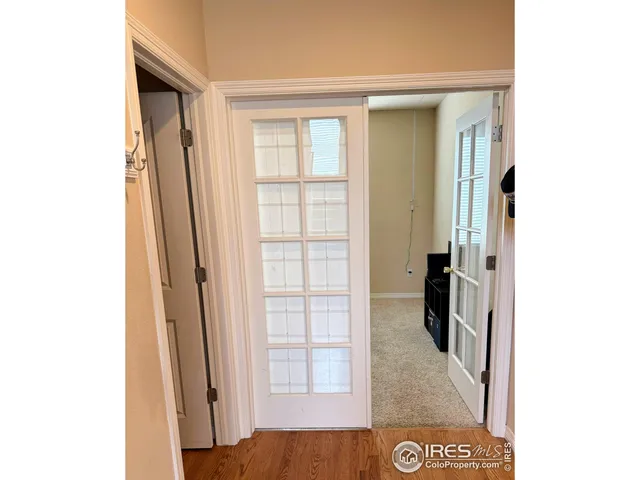 a view of entryway with wooden floor