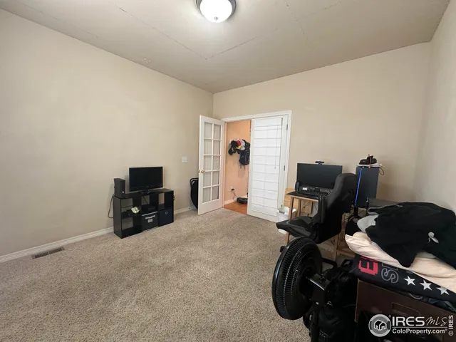 a room with furniture and window